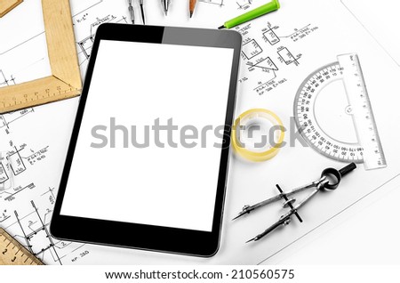 Tablet computer and engineering plan designs. Conceptual still-life.