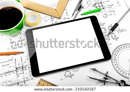 Tablet computer and engineering plan designs. Conceptual still-life.