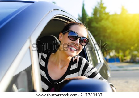 Woman drives a car