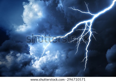 Lightning strike on the cloudy dark sky