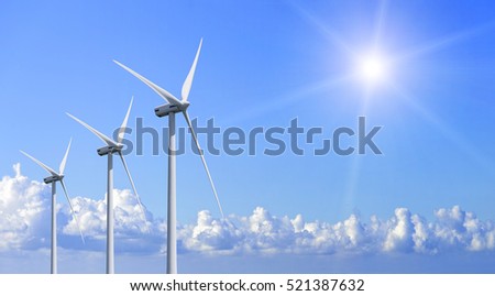 Power generation wind turbines against the blue sky with clouds.