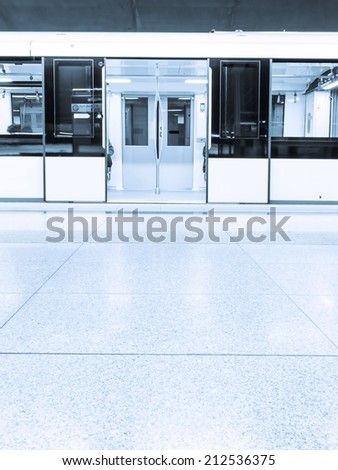 Waiting subway with open doors