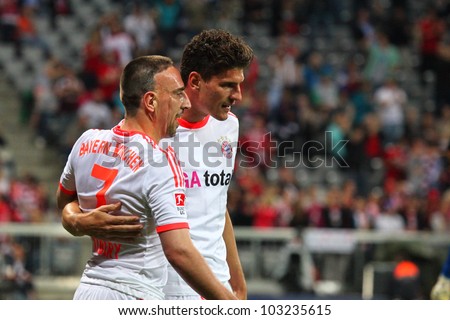 MUNICH - MAY 22: FC Bayerns Mario Gomez and Franck Ribery cheering after 3:2 goal during a friendly match between FC Bayern and the Netherland, final score 3 - 2, on May 22, 2012, in Munich, Germany.
