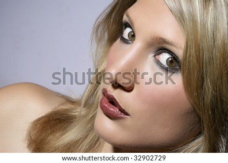 Big Eyed Beautiful Blond Woman Closeup Portrait