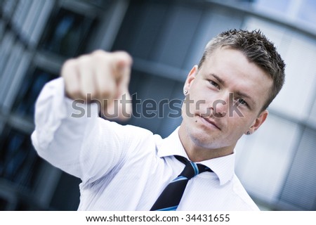 Photo Of A Handsome Corporate Man Pointing At You