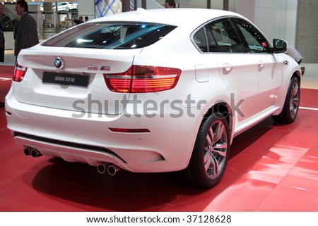 stock photo FRANKFURT SEP 15 White BMW X6 M in back view on
