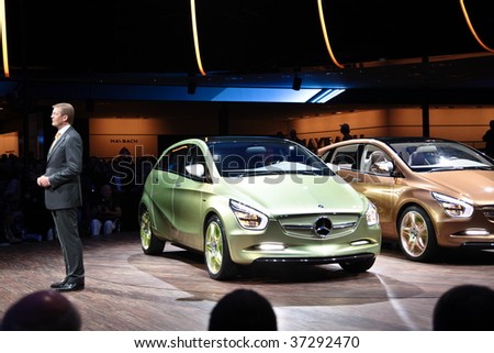 FRANKFURT - SEP 15: Mercedes Benz Board Member Dr. Thomas Weber presenting BlueZERO E-CELL PLUS an innovitive electronic car on  63rd IAA (Int. Automobil Ausstellung) on September 15, 2009 in Frankfurt, Germany