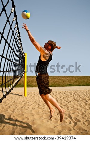 Dynamic Jump To The Net For A Volleyball Hit