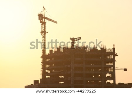 Construction Site With Crane On An Evening Sky Background In Dubai