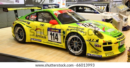 ESSEN - NOV 26: Manthey Motors Porsche 911 GT3 R shown on Essen Motor Show 2010 on November 26, 2010 in Essen, Germany.
