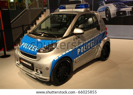 ESSEN - NOV 26: Smart tuned as part of the tune-it-save-campaign modified as police car shown on Essen Motor Show 2010 on November 26, 2010 in Essen, Germany.