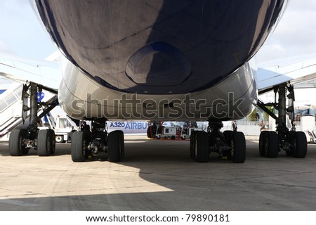 PARIS - JUN 24: Landing gear of Airbus A380 (largest passenger airliner in the world) on 49th Paris Air Show on June 24, 2011 in Paris, France.