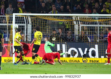 DORTMUND, GERMANY - APRIL 11: R. Lewandowski heads against the post, Neuer can only watch during a Bundesliga match between BVB Dortmund & Bayern Munich, final score 1-0, on April 11, 2012, in Dortmund, Germany.
