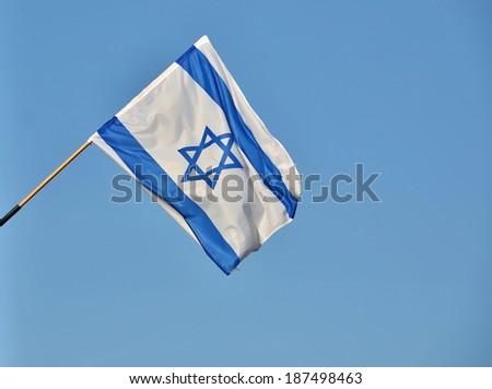 Israel flag in white and blue showing the Star of David hanging proudly for Israel\'s Independence Day (Yom Haatzmaut)
