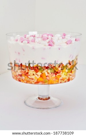 Marshmallows in cream over fruit salad desert