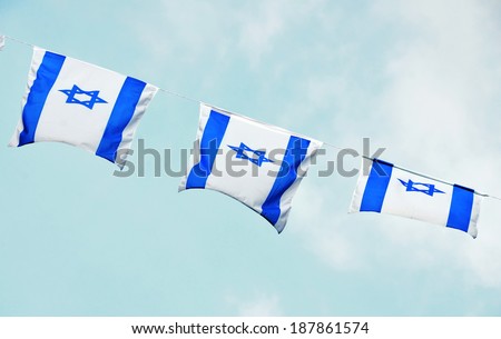 Israel flag in white and blue showing the Star of David hanging proudly for Israel\'s Independence Day (Yom Haatzmaut)