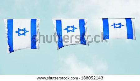 Israel flag in white and blue showing the Star of David hanging proudly for Israel's Independence Day (Yom Haatzmaut)