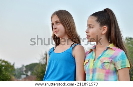 Best Friends Forever - two 12 year old teenage girls brooding