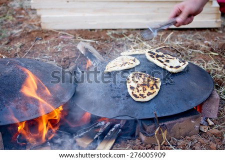 Pita bread baking on a Saj or Tava on Lag Baomer