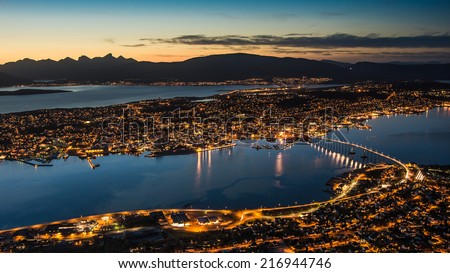 Panoramic aerial view to Tormoso city in northern Norway just after sunset - urban and nature background