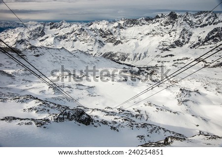 View along the cableway down to the valley from Testa Griga peak in Italian Alps, Cervinia ski resort