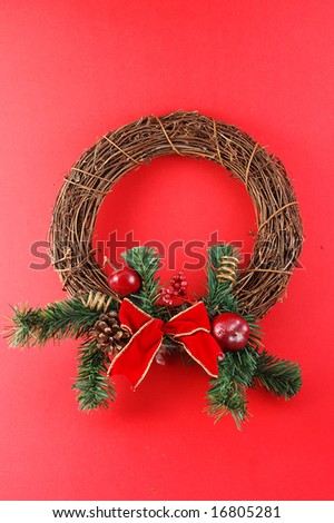 Decorations for the Christmas tree brightly lit on red background