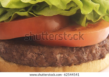 Big Hamburger with sesame bun lettuce, tomato and beef patty
