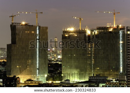 night time view of High building Construction site, Bangkok Thailand