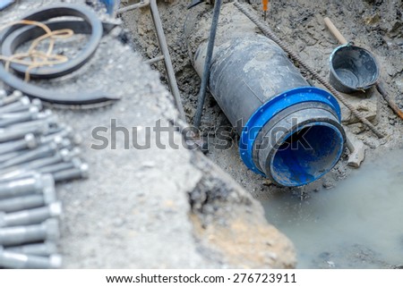 water pipe fix between  HDPE and cast iron with ductile steel pipe, 400 mm diameter