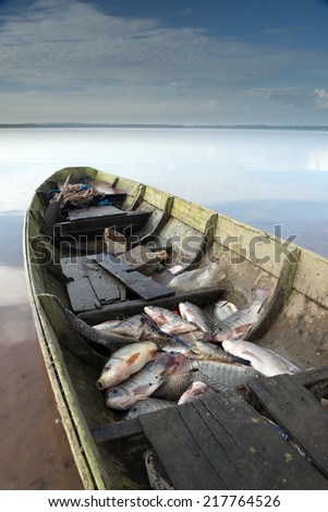 Fishing boat in the lake, Bang Pra Reservoir, Chonburi, Thailand.
