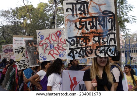 KOLKATA- DECEMBER 12: Social worker,activist with women right poster during a rally on Nirbhay Diwas the first anniversary of  Delhi rape incident on December 15, 2013 in Kolkata, India.