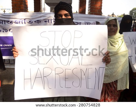 A Muslim women showing a protest banner in the occasion of Women Day rally on March 19, 2015 in Calcutta, India.