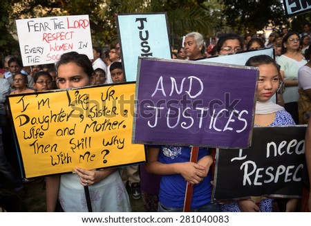 Girls with banner on occasion of rally organized by Roman Catholic Archdiocese to express solidarity with 72 yrs old nun who was ganged rape in convent school on March 16, 2015 in Calcutta, India.