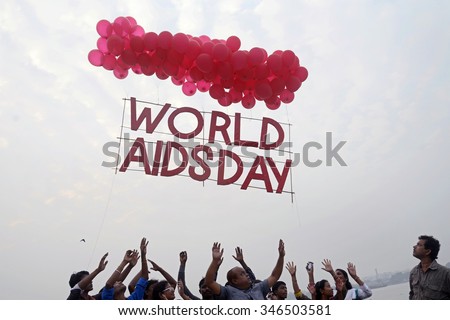 Social activist observe World AIDS Day by flying decorative gas balloons carrying message regarding eradication of stigma and panic discrimination on HIV/AIDS on December 01, 2015 in Calcutta, India.