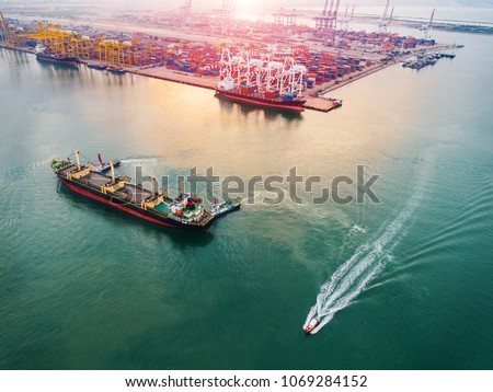 aerial view of ships vessels operation in port for loading discharging the cargo shipments with arrival and departure in an international port services