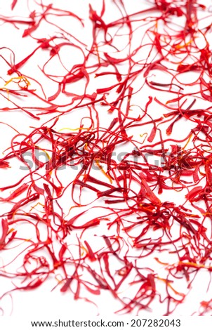 Saffron spice threads isolated on white background