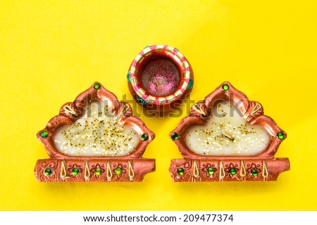 Decorative Diwali lamp on yellow background, Diwali festival India Asia South East Asia