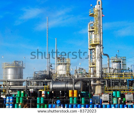 Chemical Plant with drums stacked in front