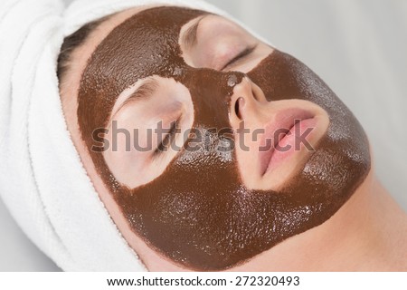 woman with a chocolate face-pack