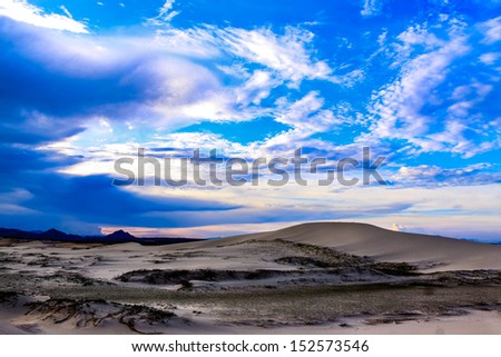 Blue sky on the sand hill
