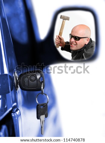 Dangerous thief in rear mirror and key at car doors. Car insurance concept.
