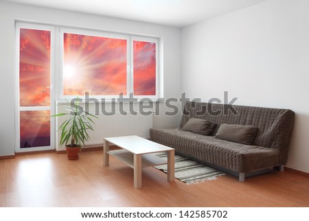 Living room with beautiful sunset view.