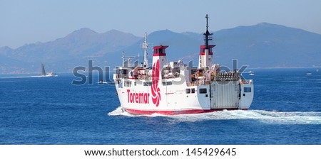 PIOMBINO, ITALY - JUNE 30: Ferry boat Giovanni Bellini cruising to Island of Elba. Ferry with capacity 700 passengers and 62 vehicles . June 30, 2013 in Piombino, Italy.