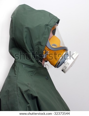 Woman wearing gas mask and protective suit.