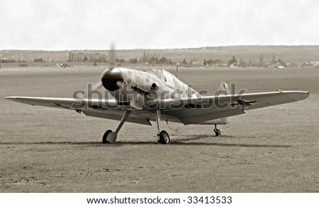 Historic plane Messerschmidt Me109 on the airfield - vintage photography