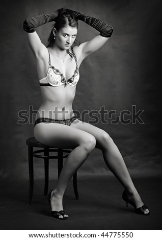 Vintage style photography. Sitting beautiful girl. Great for calendar and Valentine advertising.