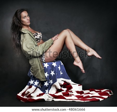 old american flag pictures. sitting on american flag.