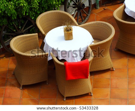Empty table in open air restaurant.