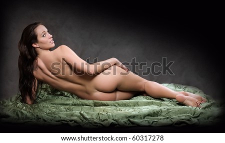 stock photo Naked beautiful woman posing on black background