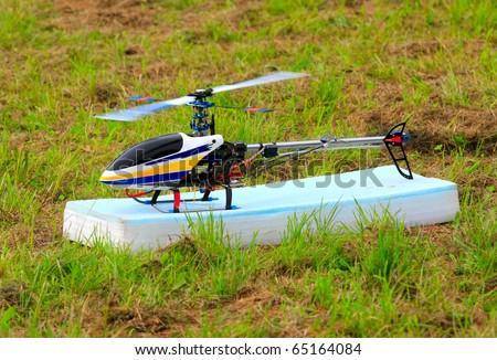 Flying helicopter (radio controlled scale-model 1:24 scale) Teleobjective shot with shallow DOF.